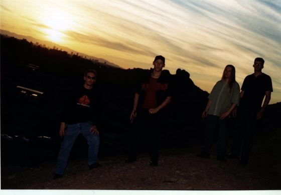 GROUNDED: silhouettes on a ridge at sunset