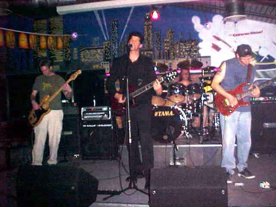 GROUNDED: live in front of the skyline mural